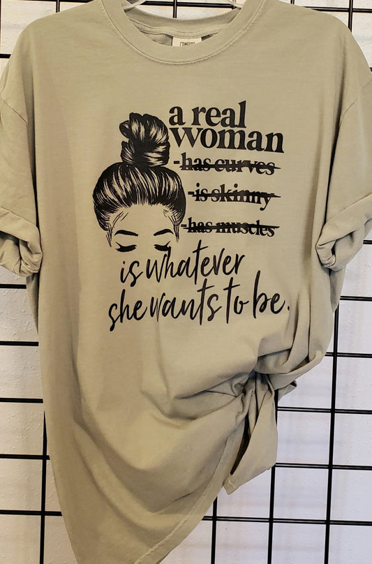 A Real Woman Comfort Colors Sandstone Unisex Tshirt